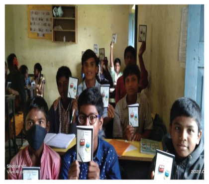 Students holding up their guidance material