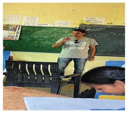 Volunteer speaking to a classroom
